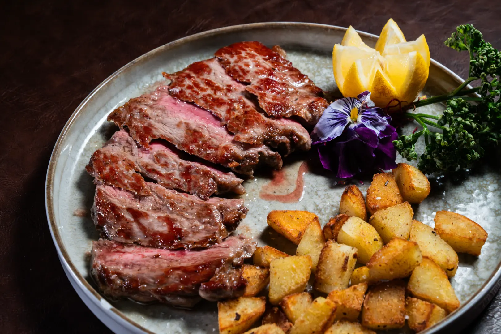 Selection of grilled meats with potatoes